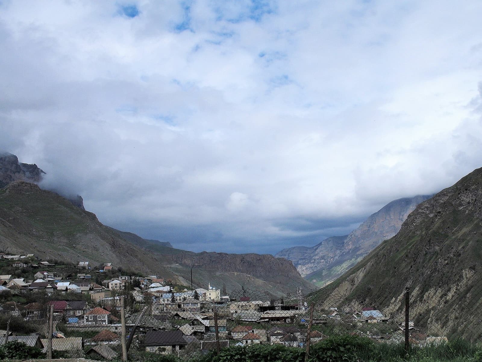 High-mountain settlement and Caucasus peaks at Bezengi