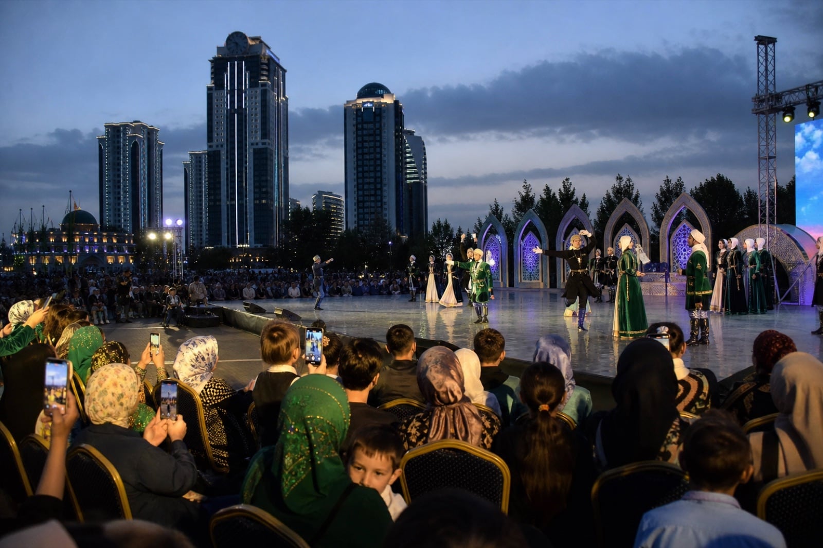 A traditional dance performance on an open-air stage in Grozny